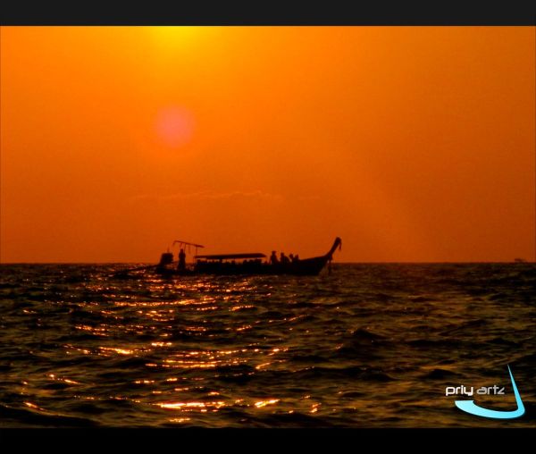 Passeio de barco ao pôr do sol
